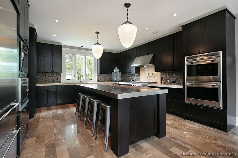 dark kitchen cabinets with mild flooring