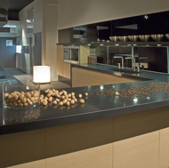 A Modern Showroom Kitchen with Compac Nocturno Quartz Countertops