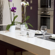 Modern Purple Kitchen with Compac Snow Quartz Countertops
