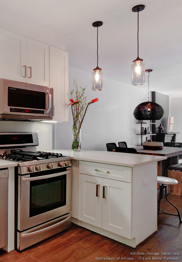 Minimalist white kitchen published in Blacklines of Design magazine