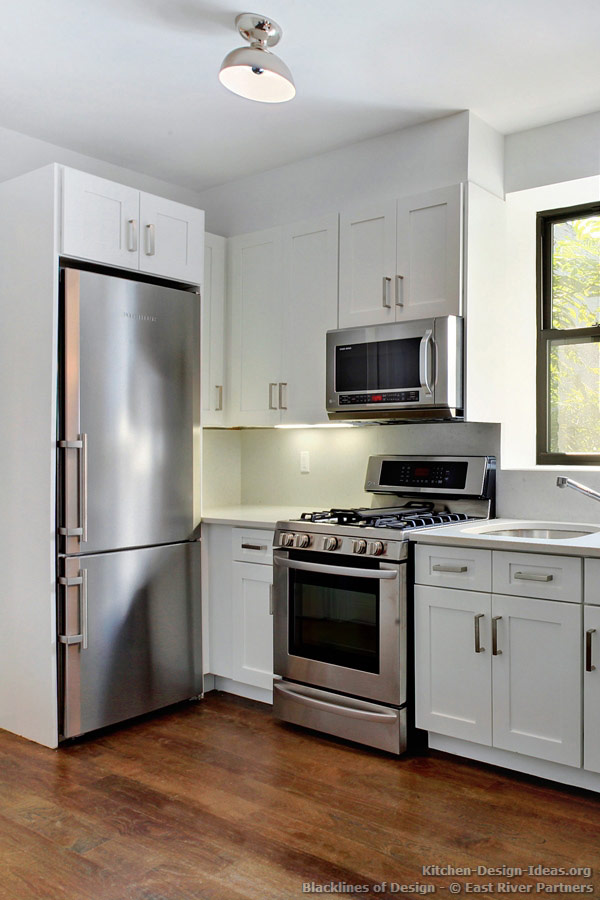 Minimalist white kitchen published in Blacklines of Design magazine
