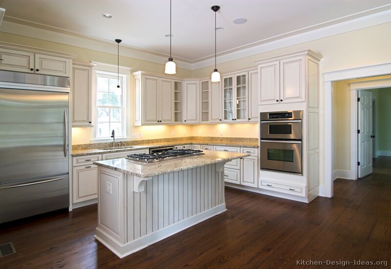 Kitchens with White Cabinets and Wood Floors