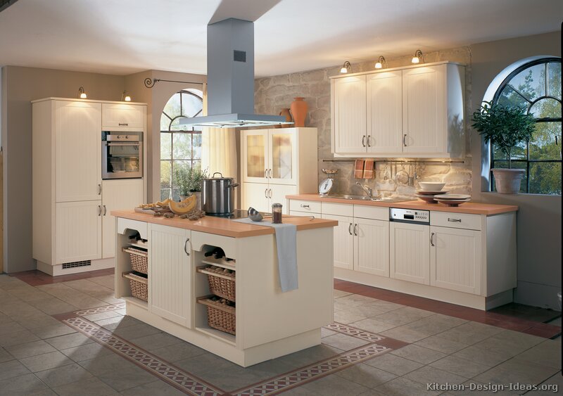 White Kitchen with Wood Cabinets and Countertops