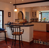 Spanish Tile Floor & Backsplash, Wrought Iron Bar Stools - Designer Kitchens LA