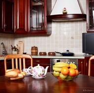 Traditional Dark Wood-Cherry Kitchen