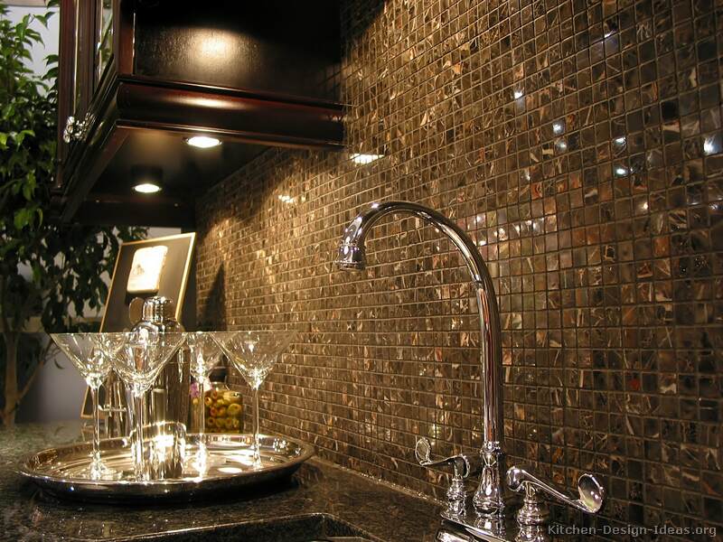 A mosaic tile backsplash featuring 5/8-inch square Michelangelo marble tiles