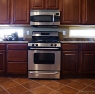 Traditional Dark Wood-Cherry Kitchen