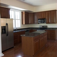 Traditional Dark Wood-Cherry Kitchen