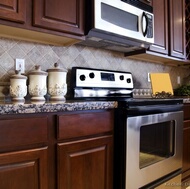 Traditional Dark Wood-Cherry Kitchen