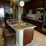 Traditional Dark Wood-Cherry Kitchen