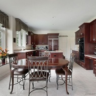 Traditional Dark Wood-Cherry Kitchen