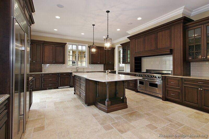 A Large Luxury Kitchen Design With Dark Walnut Stained Cabinets