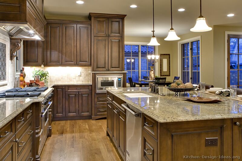 Walnut Kitchen Cabinets with Dark Floors