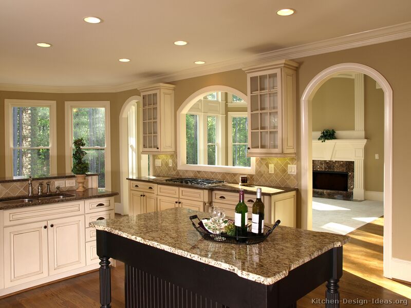 This antique white cabinetry combines