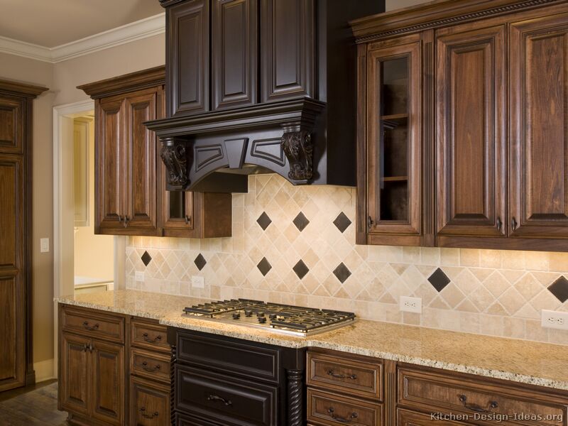 white kitchen shelves with darkish countertops