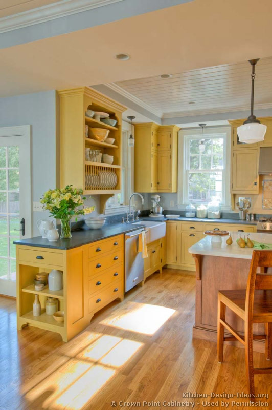 Traditional Yellow Kitchen with a Custom Wood Island