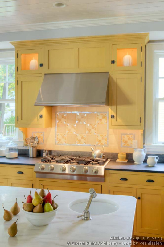 Traditional Yellow Kitchen with a Custom Wood Island