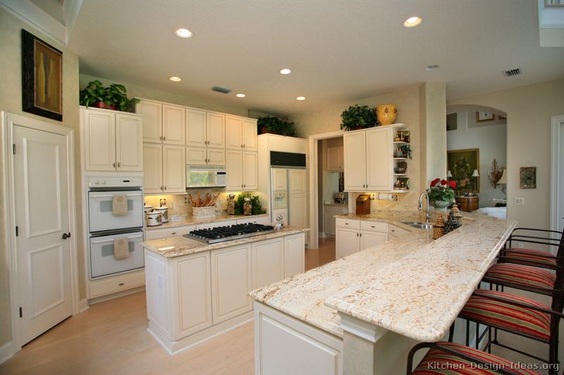 White Kitchen Cabinets With Tan Granite Countertops Transitional