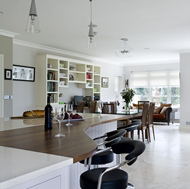 Curved Walnut Island with Bar Stools - Woodale Designs