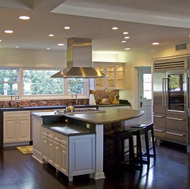 Luxury White Kitchen with a Large Island and Pearlescent Backsplash - Designer Kitchens LA